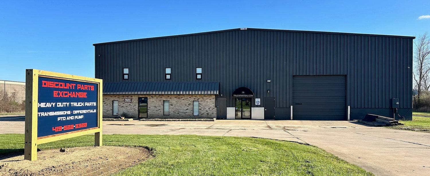 Discount Parts Exchange storefront and facility in Mansfield, Ohio — specializing in remanufactured heavy-duty transmissions, differentials, PTOs, and pumps