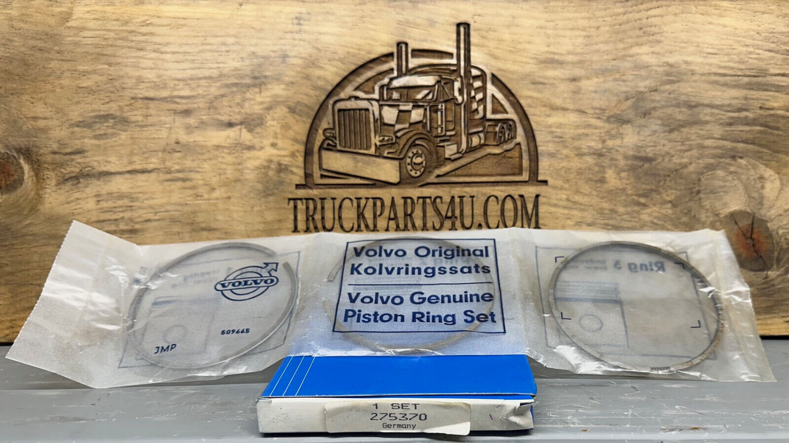Top view of Volvo Penta 275370 piston ring kit – 0.30 mm oversize, new genuine NOS marine engine part