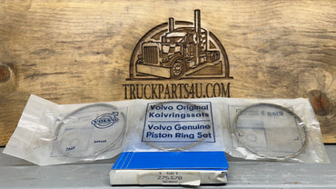 Top view of Volvo Penta 275370 piston ring kit – 0.30 mm oversize, new genuine NOS marine engine part