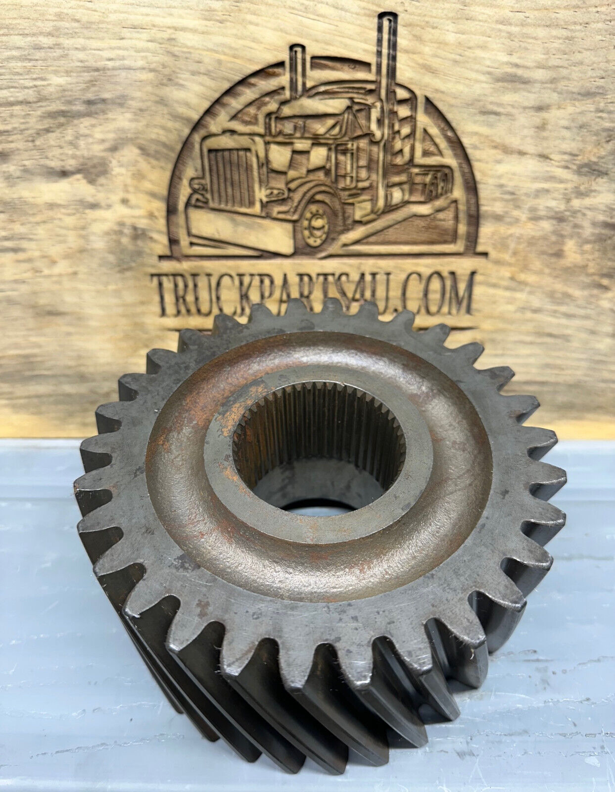 Side profile showing helical tooth angle on 3892A4473 gear, new genuine OEM for M923/M939 Rockwell transfer case
