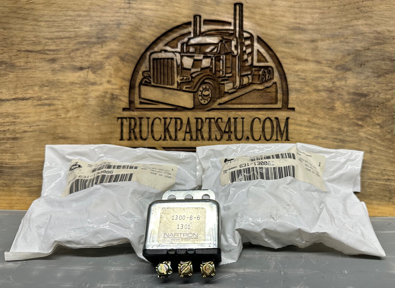 Front view of 631-130086 Mack alternator relay with Nartron 1300-8-6 marking