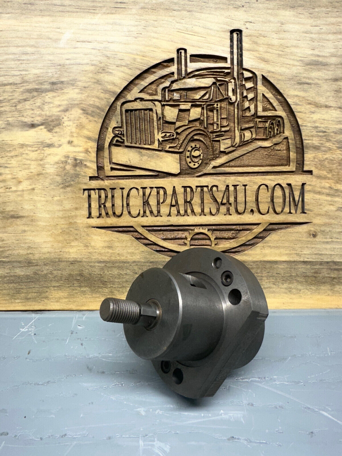 Eaton/Dana 81470 oil pump showing mounting face and bolt pattern for power divider fitment (44DS/44DT/44DP); new genuine OEM.