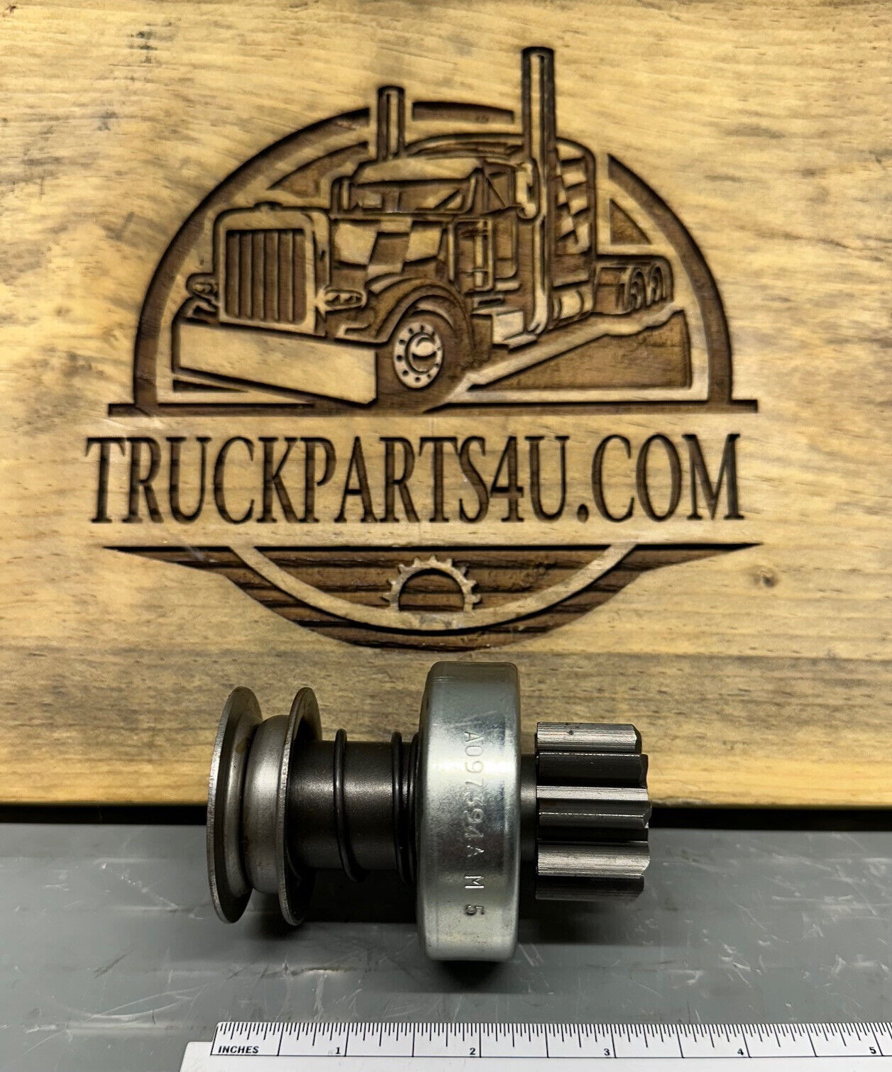 Angled view of Volvo Penta 834845 starter pinion gear – OEM part, new old stock