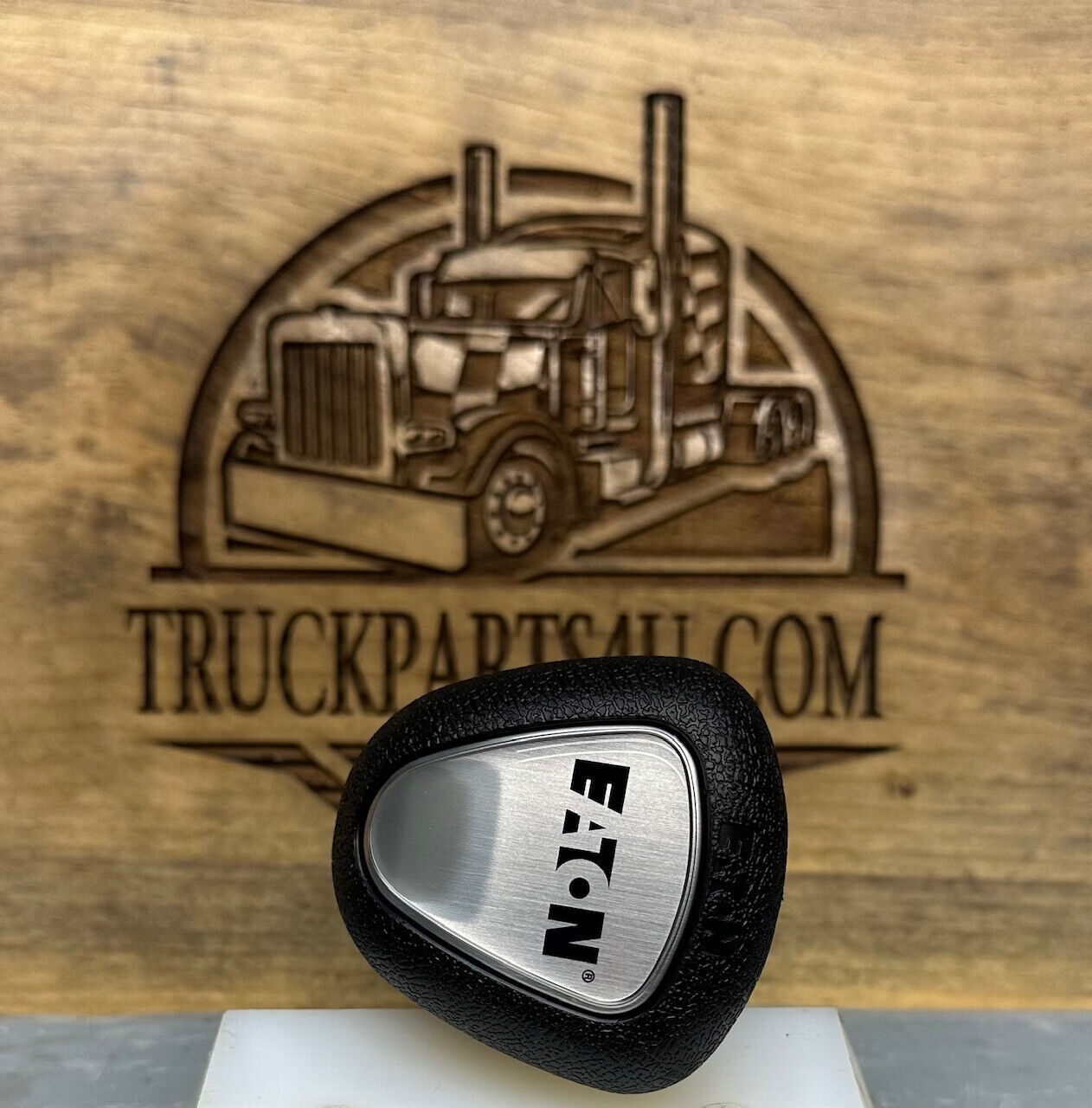 Eaton badge on A6909 pistol-grip shift knob front cap