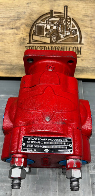 Rear view of Muncie 97022APB1X “L” Series gear pump showing manufacturer data plate – genuine Muncie pump for refuse truck hydraulic systems