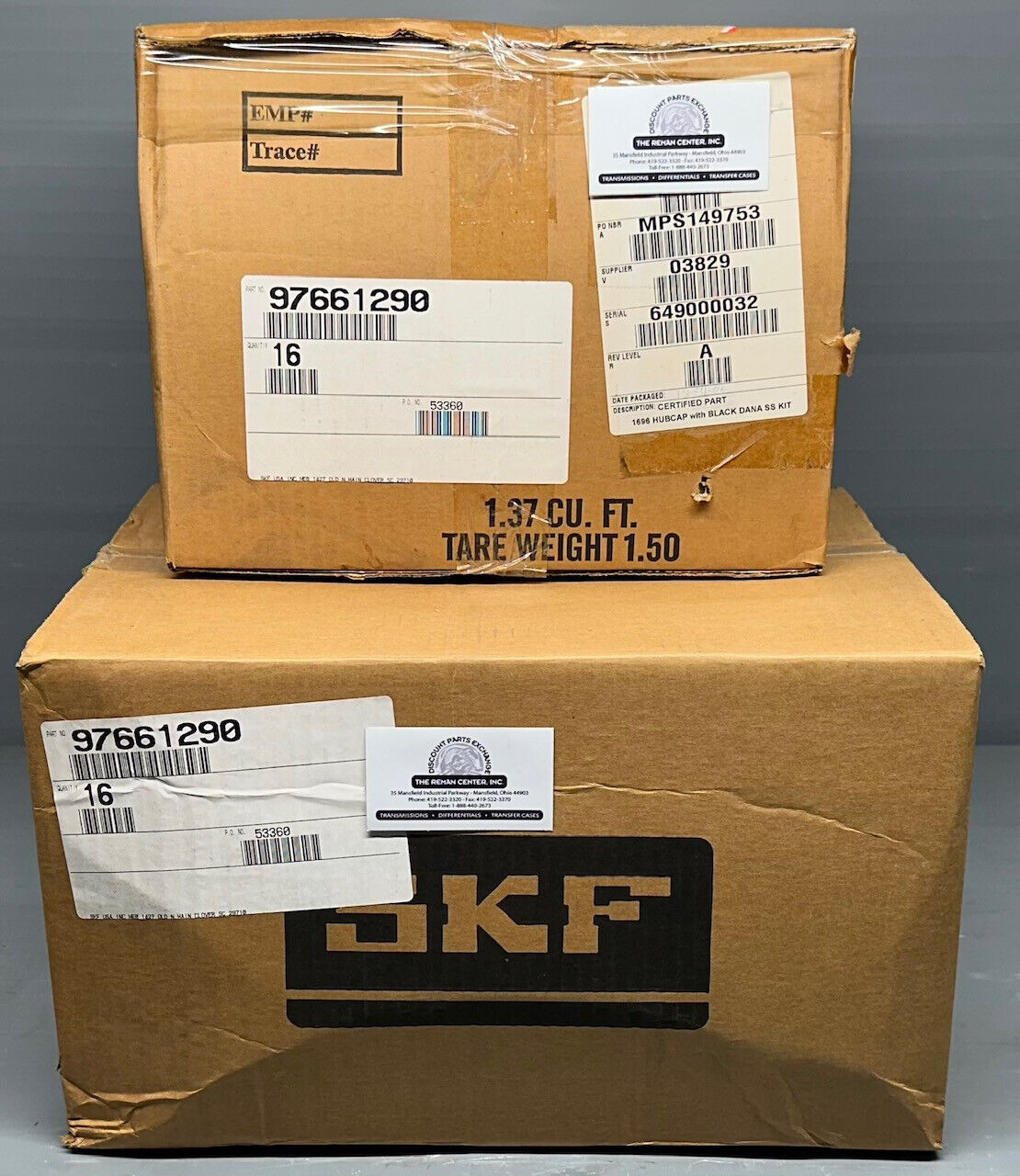 Stacked SKF master cartons for CR1696 16-pack hub caps — exterior packaging front view.
