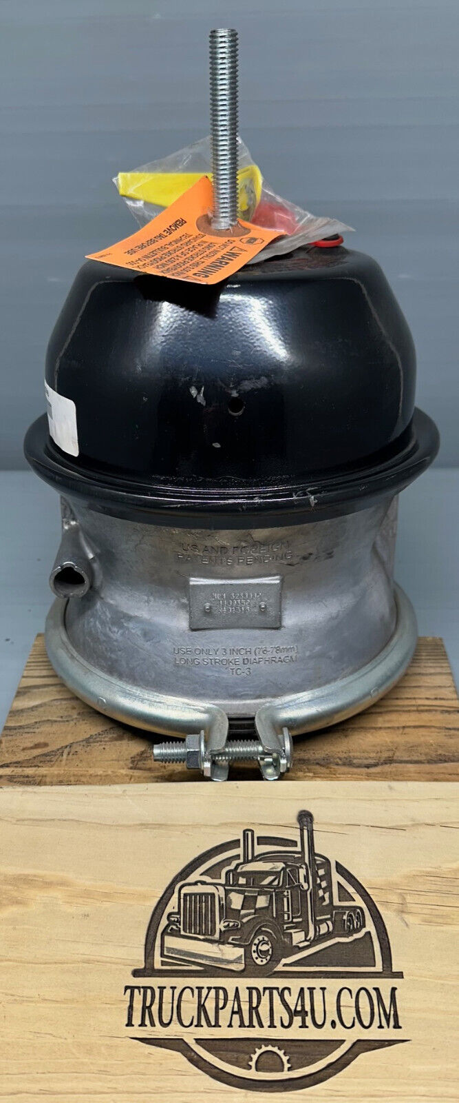 Side/profile view of MGM 3230008 TR3030LP3 long-stroke 30/30 air brake chamber with aluminum service section and mounting clamp.