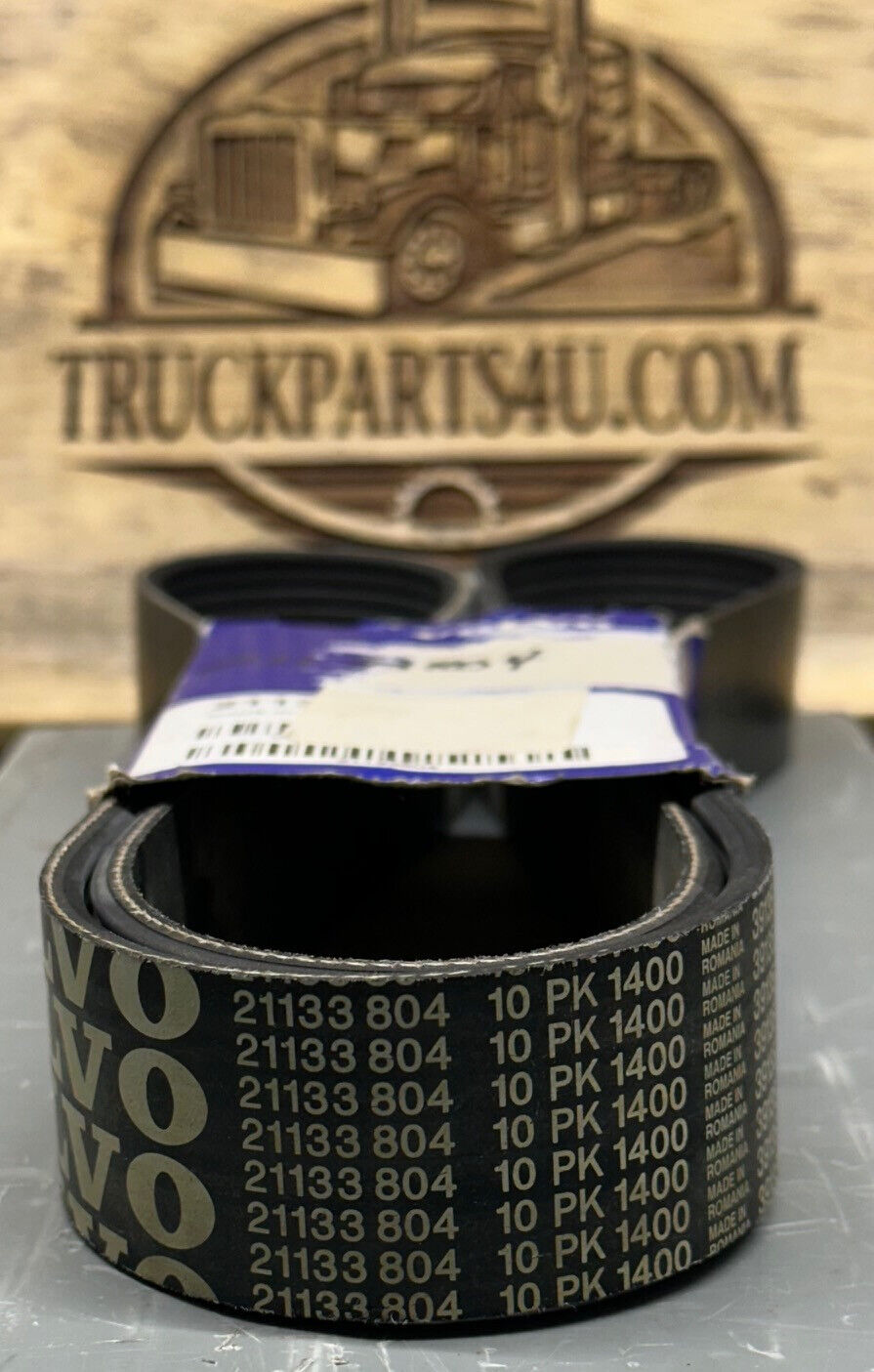  Front view of 21133804 10PK 1400 V-belt for Volvo VN/VNL applications