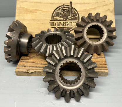 2234G267 Meritor/Rockwell/AxleTech axle side gear, 1.875 in — 20 spline, new genuine OEM; multiple gears displayed on wood block for reference