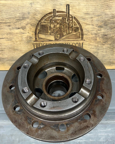 Reverse side of 3235Z884 F106 axle flange showing machined mounting face and bolt holes, New Take-Off genuine OEM