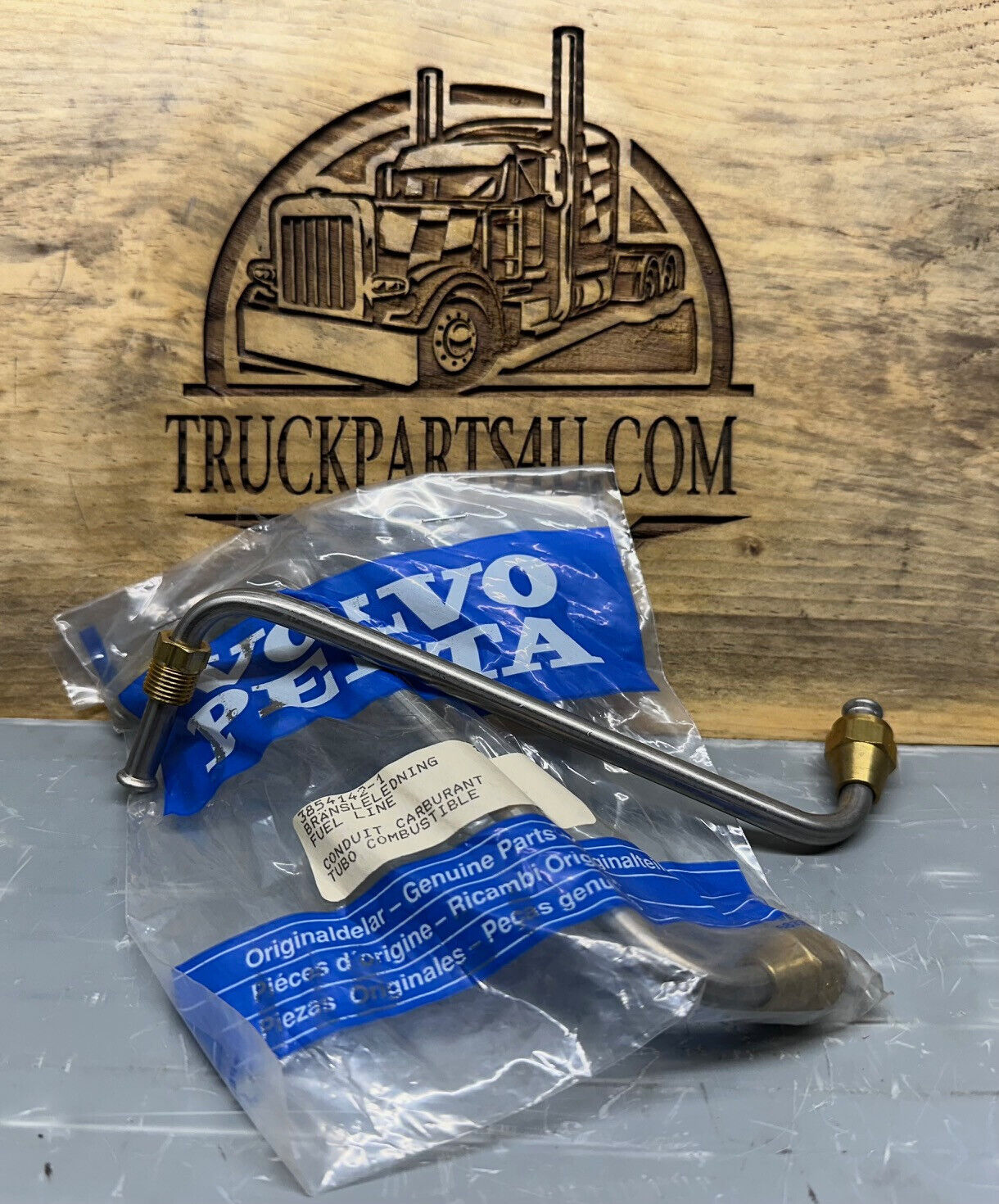 Angled view of Volvo Penta 3854142 fuel feed pipe – genuine NOS marine engine part