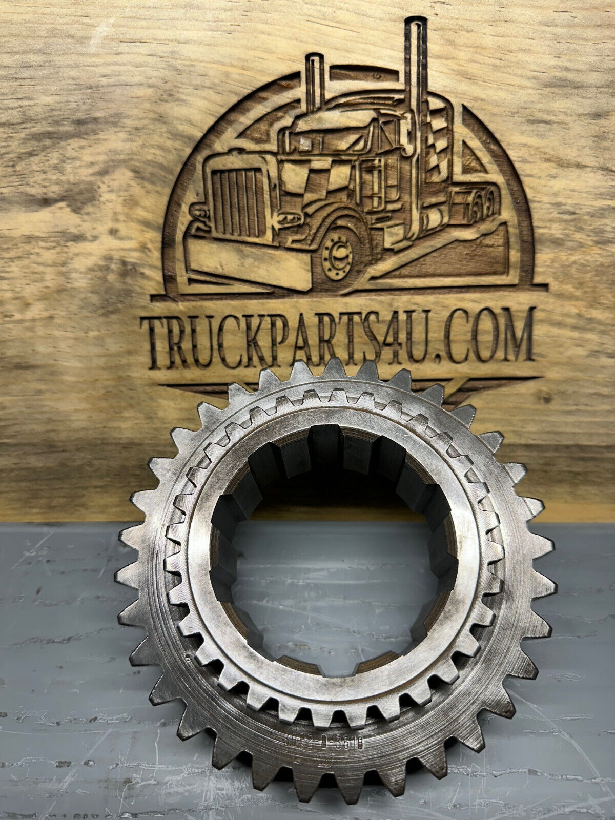 3892D3618 Meritor Rockwell AxleTech spur gear new genuine NOS front view showing gear teeth and internal spline