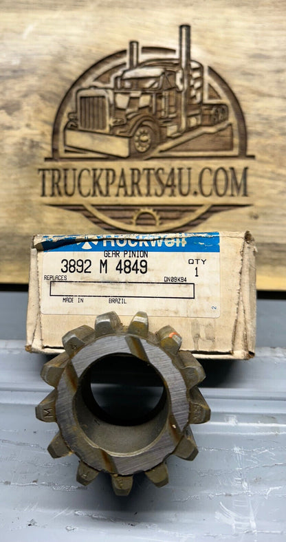 New Genuine NOS Meritor Rockwell AxleTech planetary pinion gear 3892M4849 shown with original packaging and part tag. Precision machined gear for RS15-220 series planetary systems.