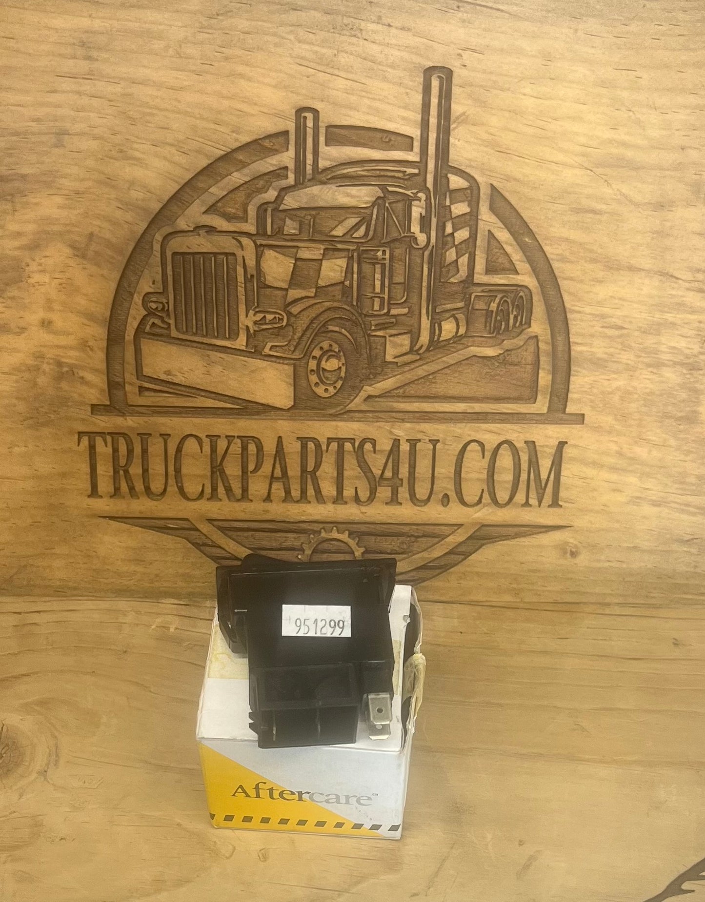 Side view of new genuine NOS SWF Sprague 511.005 rocker switch with 12V pilot light function for compatible heavy-duty electrical control systems.