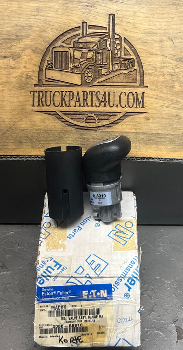 A6910 Super 10 Roadranger shift knob disassembled showing the pistol grip knob, gray thumb flipper, and black rubber boot for installation