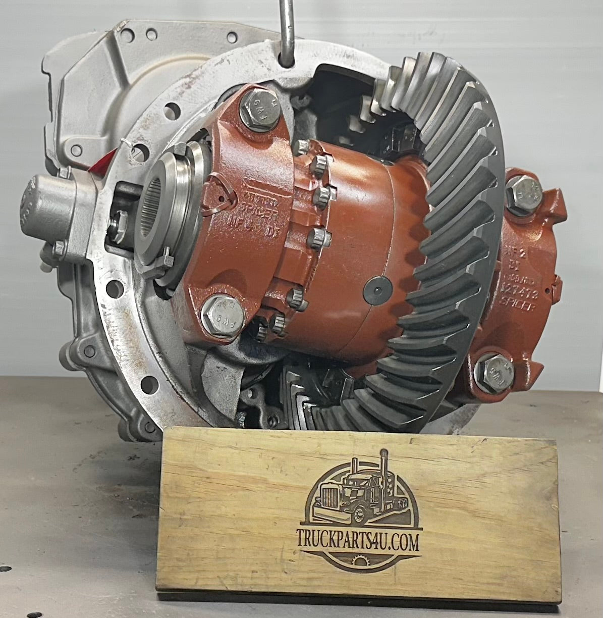 Angled view of remanufactured Dana Spicer DDP40 / DD404 forward differential highlighting internal gearing and locker components