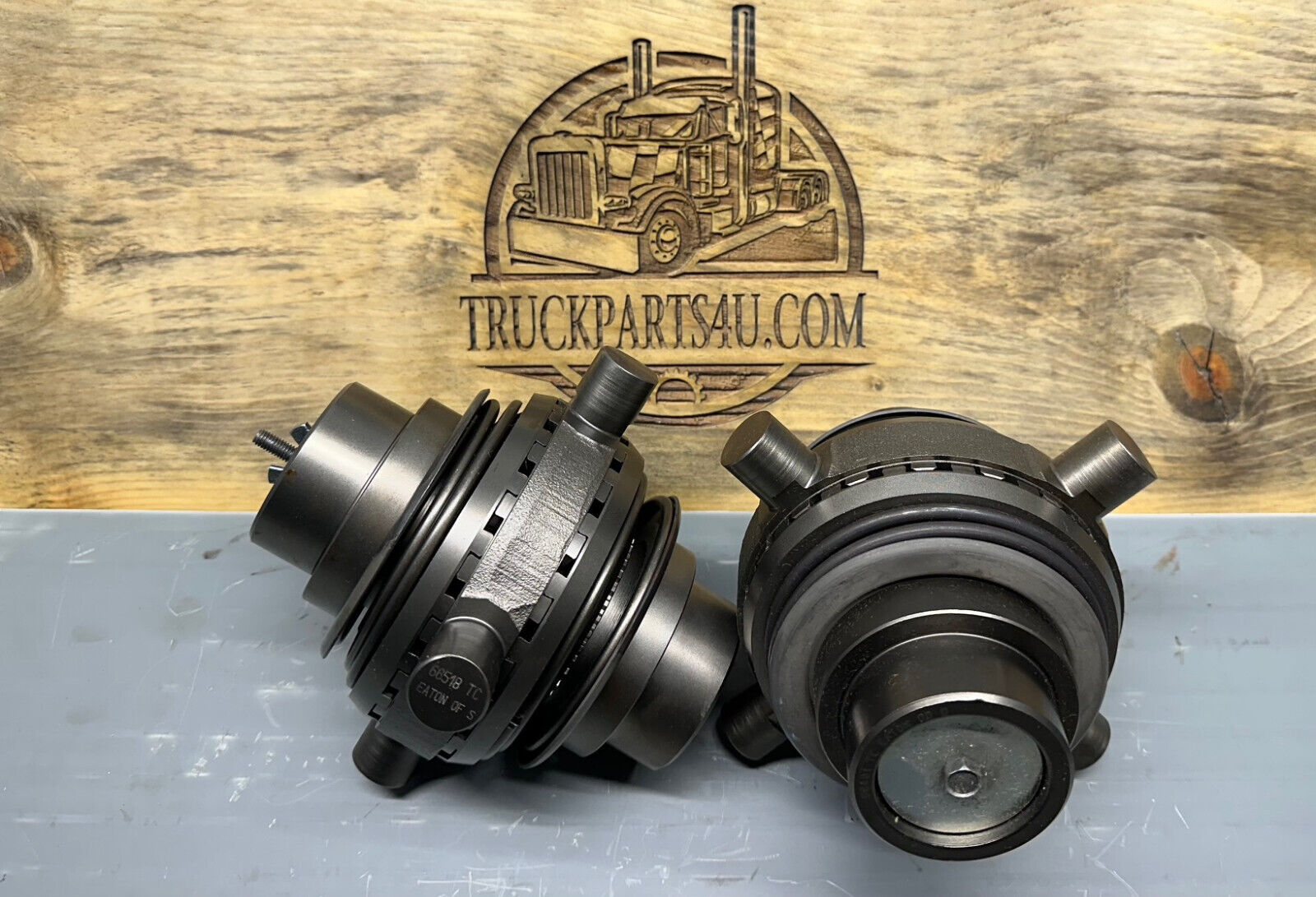 Eaton Detroit Locker 250S-97 for F106 axle, 1.750 inch 34-spline, front three-quarter view of two units