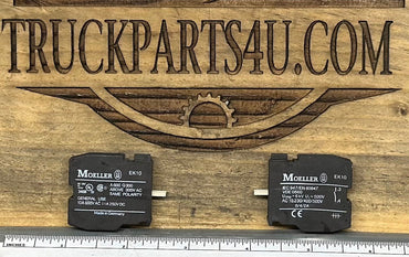 Close-up of EK10 Moeller contact block showing markings and size comparison – new genuine OEM surplus