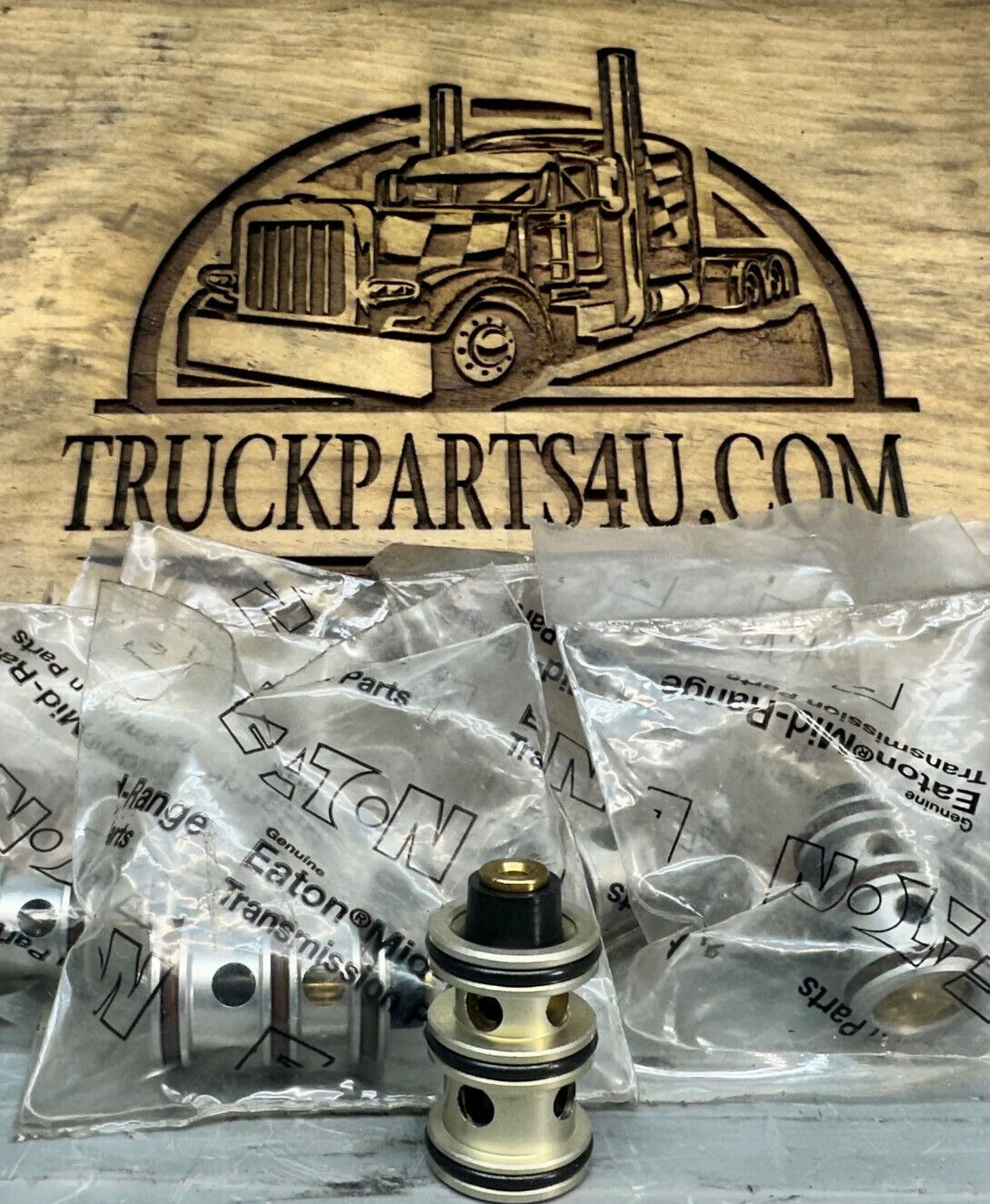 Close-up of Eaton Fuller 4300810 Super 10 insert valve for RTLO 10-speed transmissions — new genuine in OEM bag