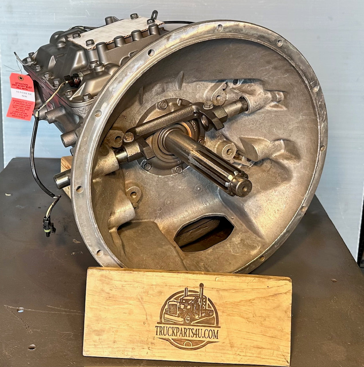 Remanufactured Eaton Fuller FS5406A (FS5406) 6-speed, front-right angle showing SAE #2 bellhousing, case ribs, and PTO port — TA-C15-036249 by Discount Parts Exchange.