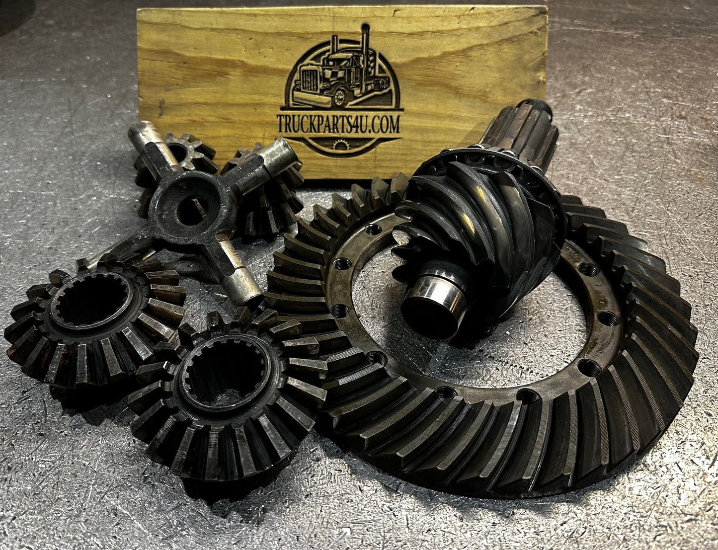 Rebuilt GM Eaton HO72 / H072 differential gearset (4.10 ratio, 41/10 teeth) with 17 spline axle nest set (spider gears, cross shaft). Inspected and functional internals. Outright sale from Ohio's premier heavy-duty drivetrain rebuilder.