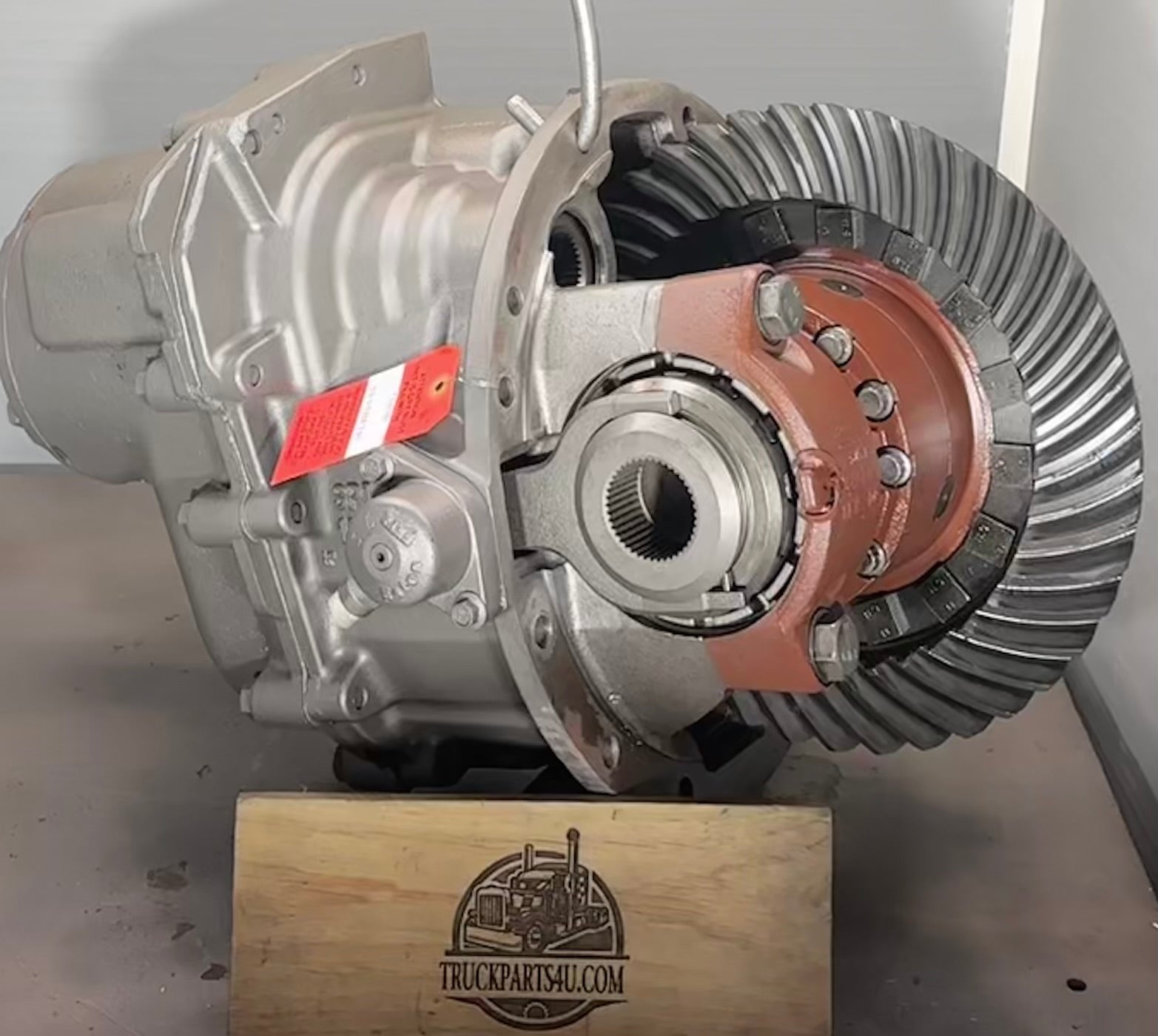 Rear input side view of remanufactured Dana Spicer DDP40 / DD404 forward differential showing input yoke, power divider, and Driver Controlled Locker mechanism