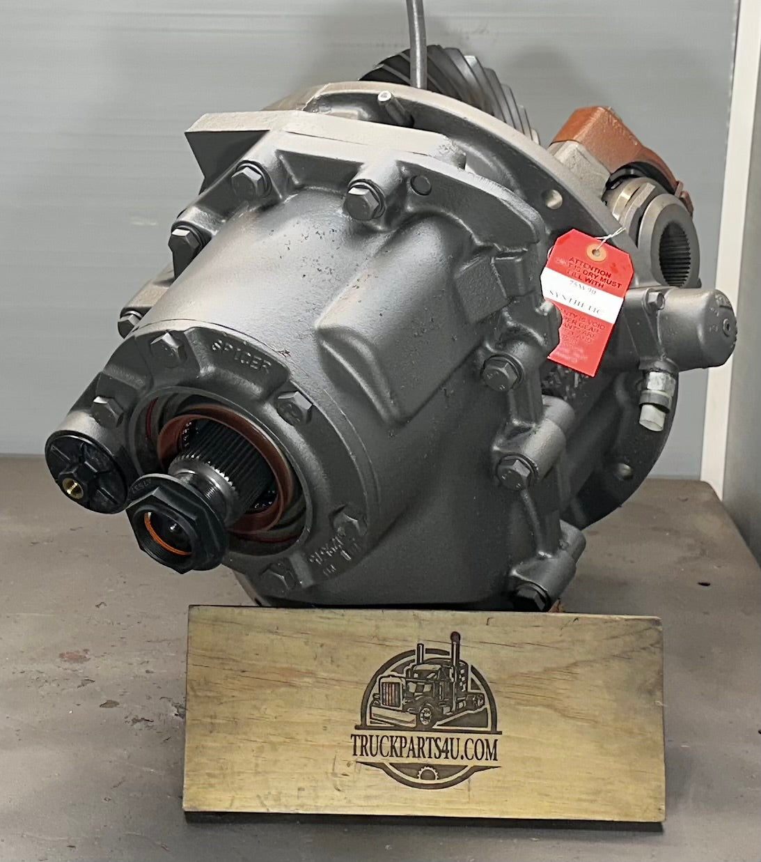 Side view of remanufactured Dana Spicer DD404 forward tandem differential with power divider and Driver Controlled Locker