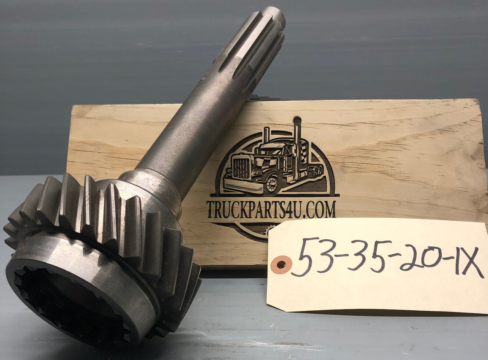 Dana Spicer / TTC input shaft 53-35-20-1X — CM5852 application, 1.500 inch 10-spline, front angled view with ID tag