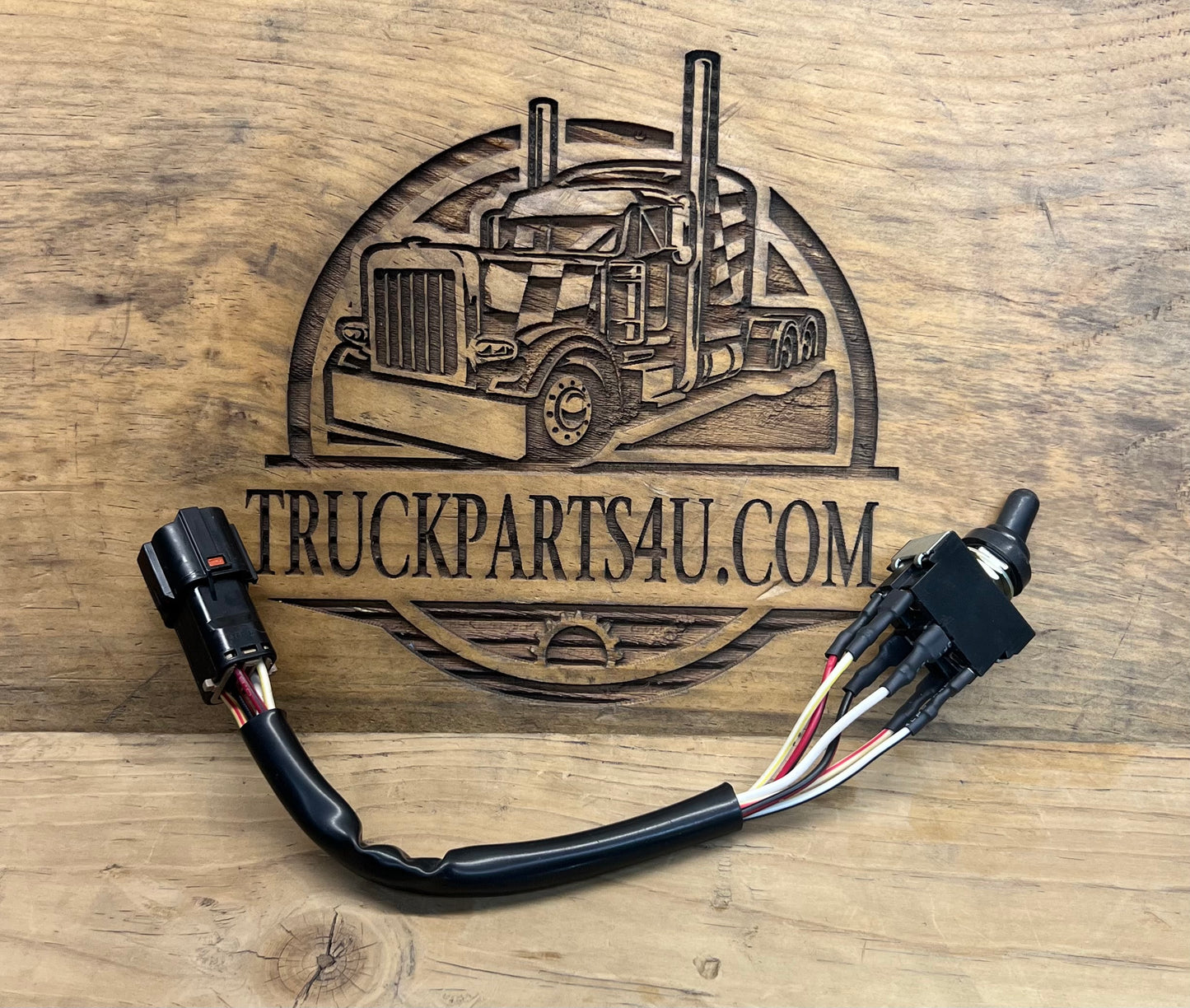Full view of Volvo CE 14526156 toggle switch assembly showing the attached wiring harness and multi-pin electrical connector