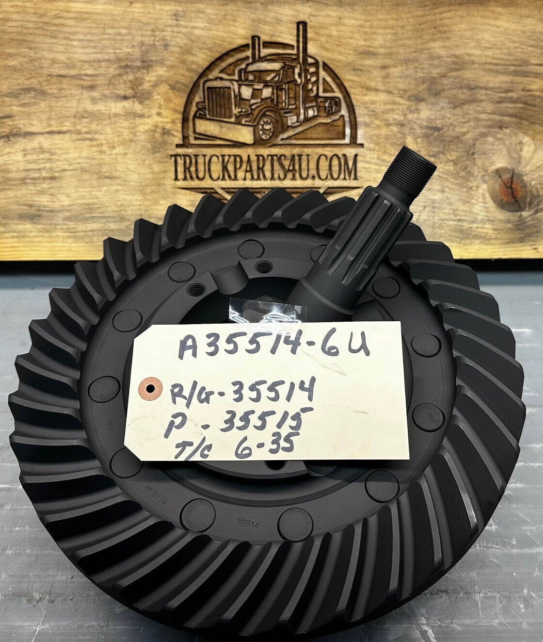 A35514-6 Rockwell Meritor D100 ring and pinion gear set, 5.83 ratio (35/6 teeth), used OEM; ring gear riveted to carrier with matching pinion shown