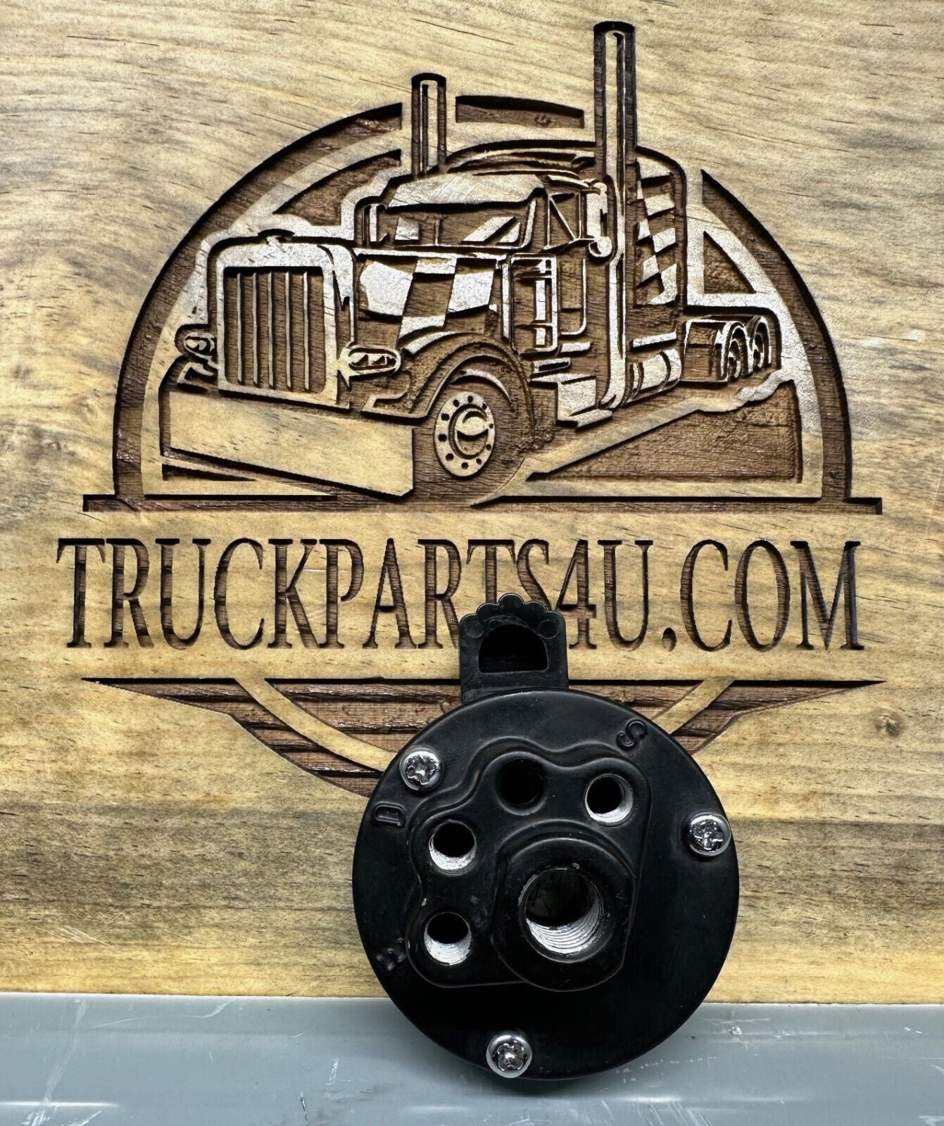 A-4491 Fuller puck style shift knob | aftermarket machined aluminum knob for Eaton Fuller 13-speed transmissions | face-down view showing valve ports