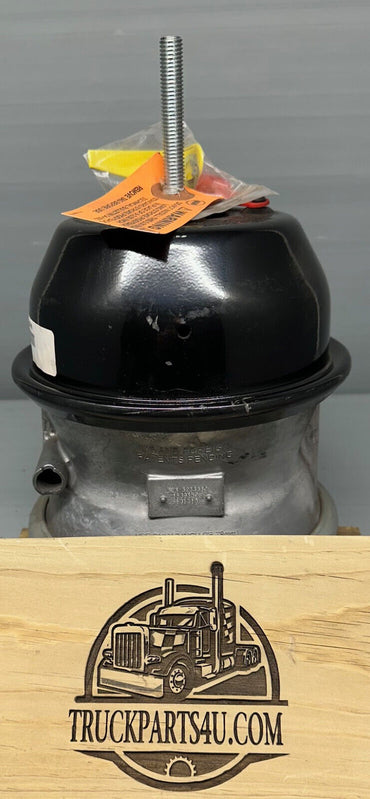 Top view of MGM TR3030LP3 30/30 spring brake chamber highlighting caged release bolt with warning tags and black spring housing.